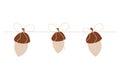 Acorns on a rope fall garland in cartoon style isolated on a white background. Forest decoration, seasonal nature