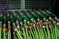 Acoustic audio cable server. Green audio cable. Many acoustic cables. ÃÂ¡oaxial cable for data transmission server. Close up Royalty Free Stock Photo