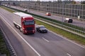 Acoustic barriers on the highway protecting residents against noise generated by car traffic. Road transport