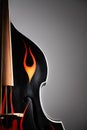Acoustic double bass with flames decals, close-up view.