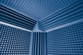 Acoustic foam absorber and bass traps for sound dampering, blue background