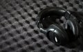 Acoustic foam wall and headphone Royalty Free Stock Photo