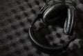 Acoustic foam wall and headphone Royalty Free Stock Photo