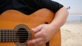 Acoustic Guitar Arpeggios. Man Playing Guitar Outdoors On The Acoustic Western Guitar With Steel. Romantic Mood, Musical
