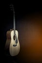 Acoustic guitar on black background Royalty Free Stock Photo