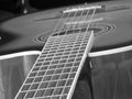 Acoustic guitar close-up, Musical concept in black and white Royalty Free Stock Photo