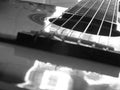 Acoustic guitar close-up, Musical concept in black and white Royalty Free Stock Photo