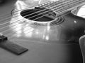 Acoustic guitar close-up, Musical concept in black and white Royalty Free Stock Photo