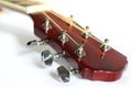 Acoustic guitar headstock on white Royalty Free Stock Photo