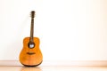 Acoustic guitar isolate white wall background Royalty Free Stock Photo