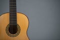 Acoustic guitar isolated on gray background copy space for text Royalty Free Stock Photo