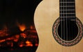 Acoustic guitar near the fire