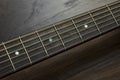 Acoustic guitar neck fingerboard frets strings music case close inlay creativity art sound vibration play music guitarist musician