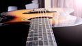 Acoustic guitar neck in the sunlight closeup Royalty Free Stock Photo