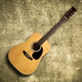 Acoustic guitar on old wall Royalty Free Stock Photo