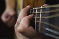 Acoustic Guitar Player Performing. Guitarist Playing In Music Studio