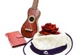 Acoustic guitar and red rose flower, isolated on white Royalty Free Stock Photo