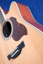 Acoustic guitar top with six strings closeup Royalty Free Stock Photo
