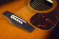 Acoustic guitar top with six strings closeupde Royalty Free Stock Photo