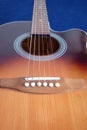 Acoustic guitar top with six strings isolated closeup Royalty Free Stock Photo