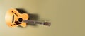 Acoustic guitar on a yellow background with copy space. Generative AI. Royalty Free Stock Photo