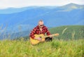 Acoustic music. Music for soul. Playing music. Sound of freedom. In unison with nature. Musician hiker find inspiration Royalty Free Stock Photo