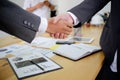 acquisition business people shaking hands, finishing up a meeting. Royalty Free Stock Photo