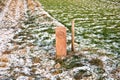 Acre with boundary stone covered with snow Royalty Free Stock Photo