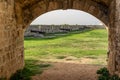 ACRE, ISRAEL - MARCH 23, 2018: Old Acre city walls, Israel. A heavy land defensive wall with cannon outposts.