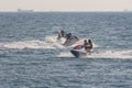 Acre, Israel - 11.05.2018: Sports active rest on the Mediterranean sea. Young people racing on jet ski, water scooter. Active Royalty Free Stock Photo