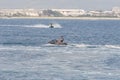 Acre, Israel - 11.05.2018: Sports active rest. Young people racing on jet ski. Active summer vacation on the Mediterranean sea. Royalty Free Stock Photo