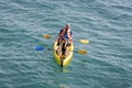 Acre, Israel - 11.05.2018: Sports outdoor active rest. Two young men paddling on tandem sea kayak. Active summer vacation on the