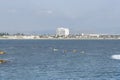 Acre, Israel - 11.05.2018: Young people paddling on tandem sea kayak. Active sports outdoor summer vacation on the sea. Background