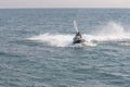 Acre, Israel - 11.05.2018: Young people racing on jet ski. Active sports summer vacation on the Mediterranean sea Royalty Free Stock Photo