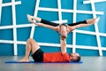 Acro yoga concept. Couple yoga class workout