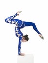 Acrobat, a circus artist in a blue suit. Royalty Free Stock Photo