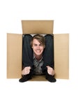 Acrobat inside of a cardboard box.