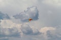 Acrobatic airplane on dark clouds Royalty Free Stock Photo