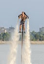 Acrobatic Jetsky pilot training on the lake. Aeronautic show