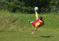 Acrobatic soccer player Royalty Free Stock Photo