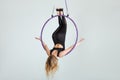 Acrobatic trick on the hula hoopa. Royalty Free Stock Photo