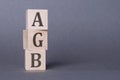 The acronym AGB is standing on wooden cubes, german language, general terms and conditions for businesses