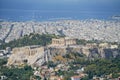 The Acropolis in centre of urban Athens view from top Mount Lycabettus