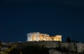 Acropolis hill with shiny famous Parthenon temple on night sky background, Athens, Greece Royalty Free Stock Photo