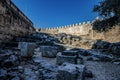 The Acropolis of Lindos in Rhodes, Greece at sunset. Scenic view of Doric columns from the ancient Temple of Athena Lindia setting Royalty Free Stock Photo