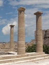 Acropolis of Lindos, the ruins of an ancient temple and the remains of the Doric columns. Lindos, Rhodes, Greece Royalty Free Stock Photo