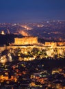 Vertical view of illuminated Acropolis of Athens. Greece at night background Royalty Free Stock Photo