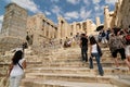 Acropolis and people walking in the ancient city in Athens, Greece. Royalty Free Stock Photo