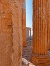 Acropolis, view between columns to the small Ionian style Athena Nike (victorious) ancient temple.