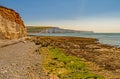 Across the mossy beach and bay to the Seven Sisters Cliffs,Sussex